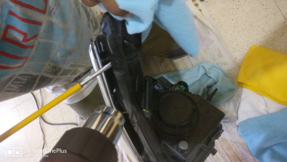 11. Prying while heating with the gun.jpg