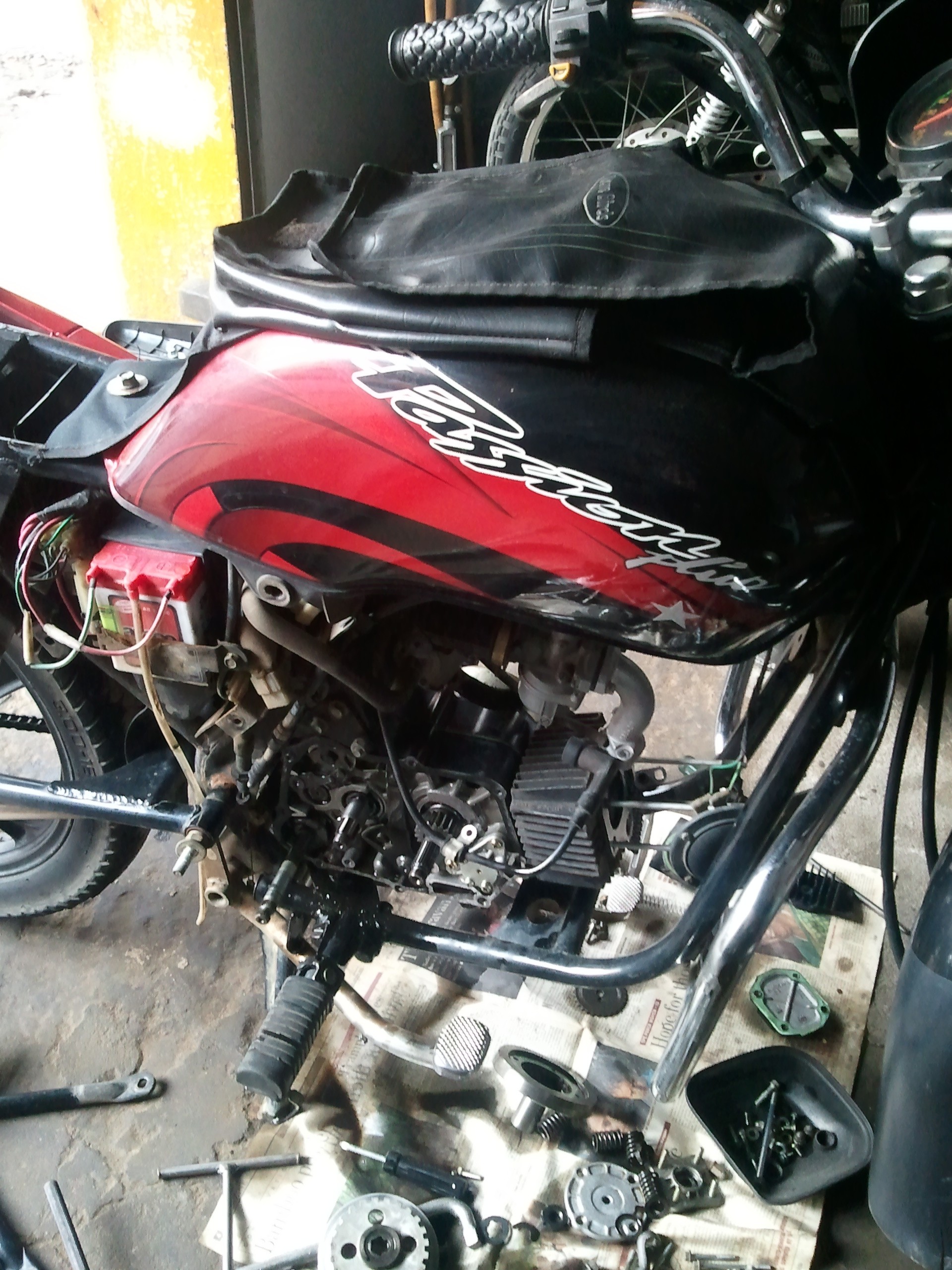 Passion plus discount bike engine price