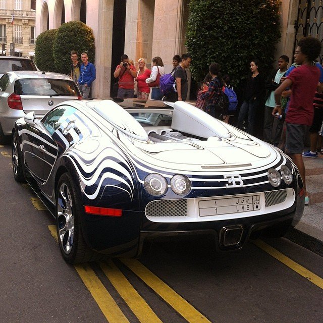 The Bugatti Veyron GrandSport OR BLANC is in Paris in front of the George V..jpg