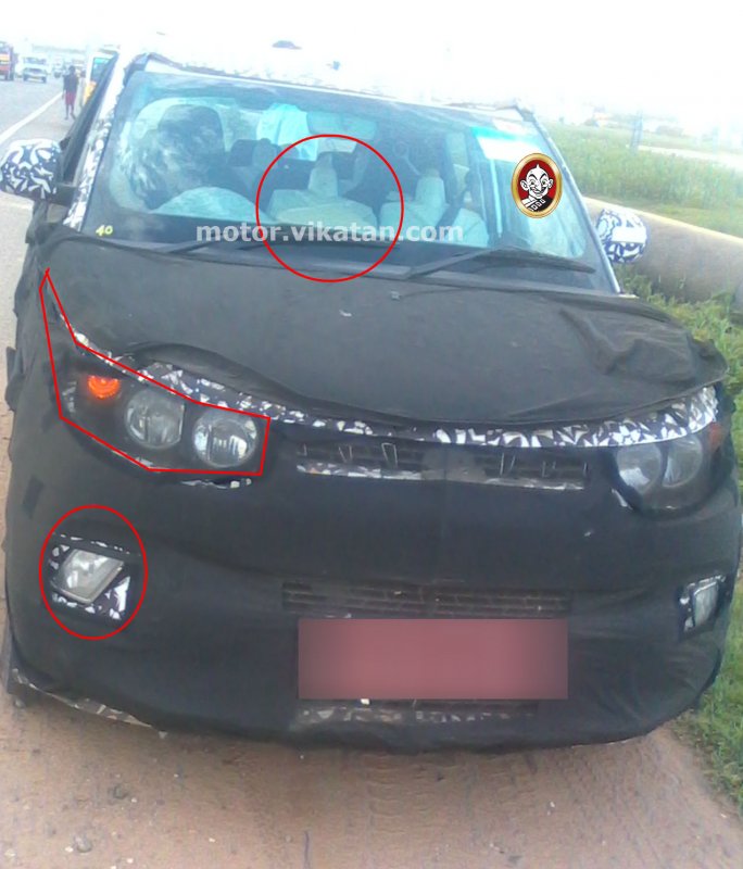 Spied-Mahindra-S101-front-seats.jpg