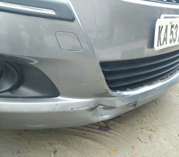 Maruti Swift Front Bumper Dent.jpg