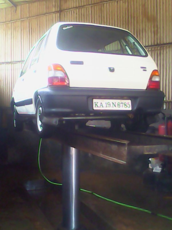 1 - car on 2 stagae Lift  cleaning.jpg