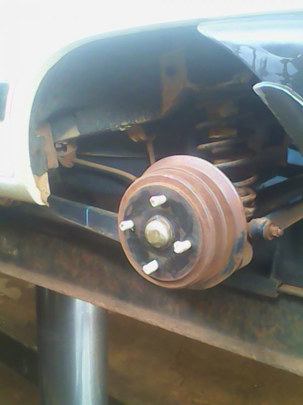 6 - Rear Wheel Hub Bolts wrapped with tape.jpg