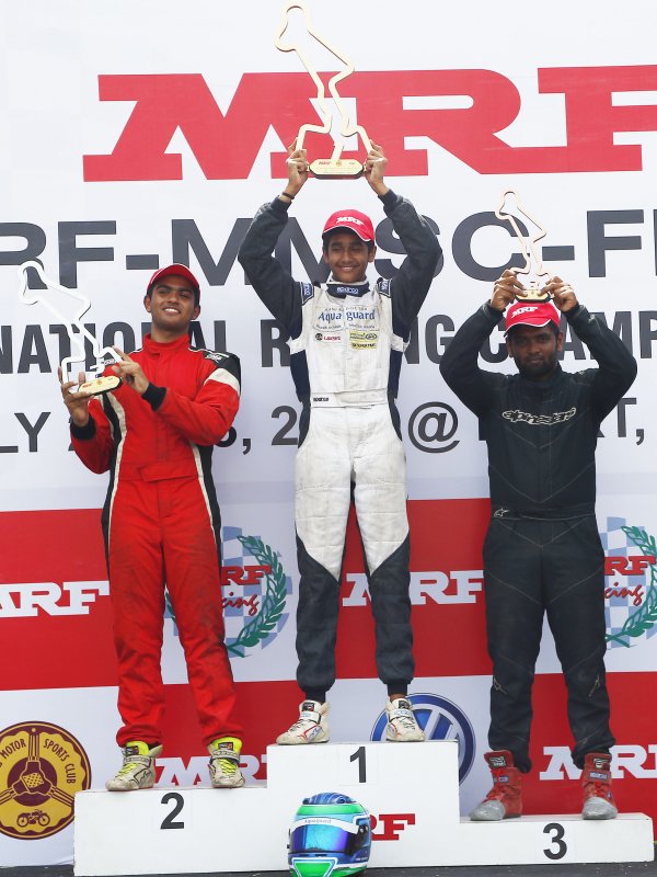 Yash Aradhya (centre), winner of Formula LGB Rookie race flanked by Arya Singh (left) and Bala P.JPG