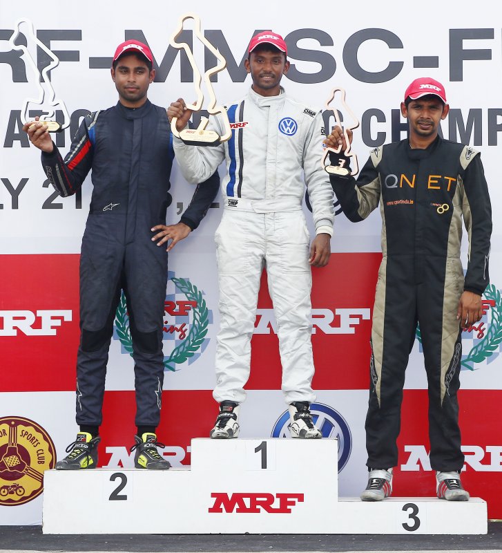 Sandeep Kumar (centre), winner of MRF FF1600 Race 2 flanked by Anindith Reddy (left) and Chetan .JPG