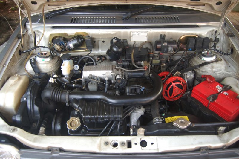 engine bay after fitting booster.jpg