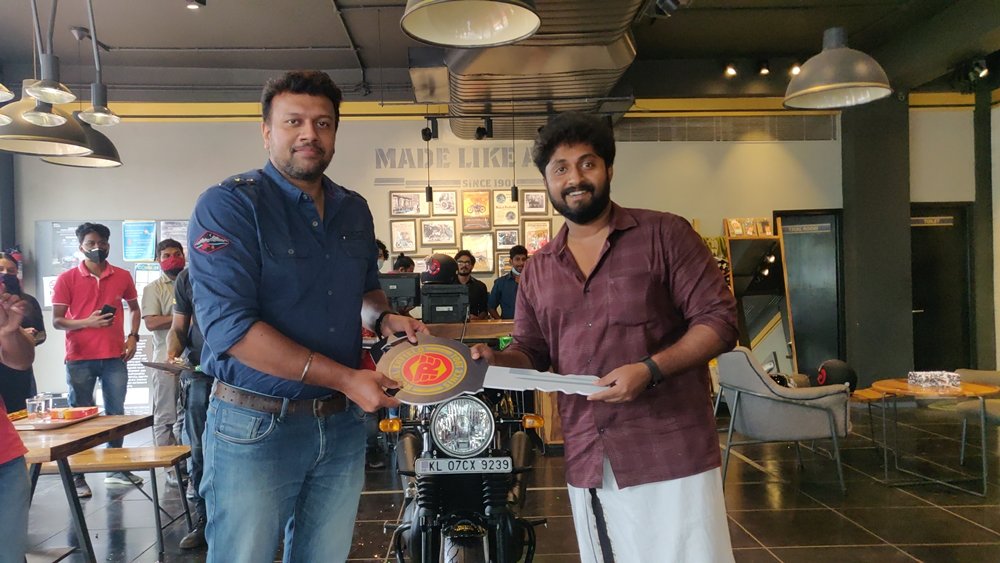 Dhyan Sreenivasan taking delivery of the Limited 120 years Anniversary Edition Interceptor 650.jpg