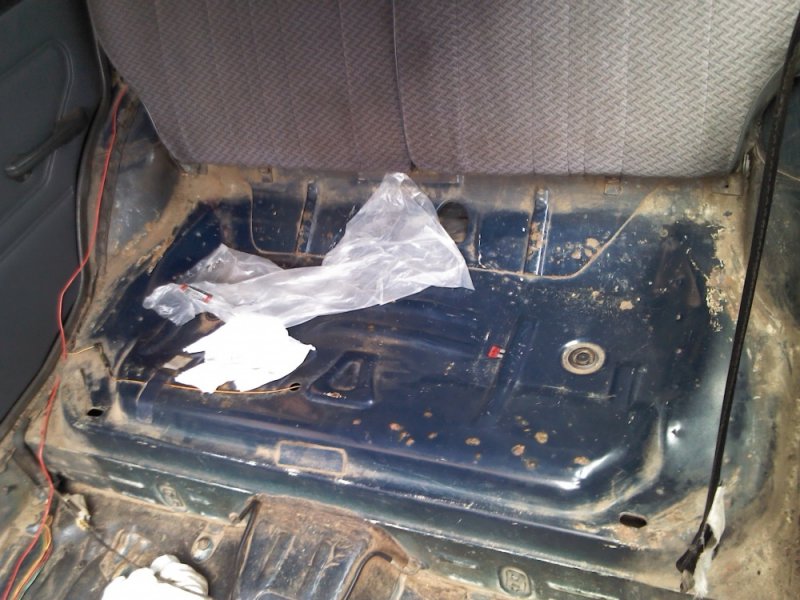 Rust around back seat.jpg